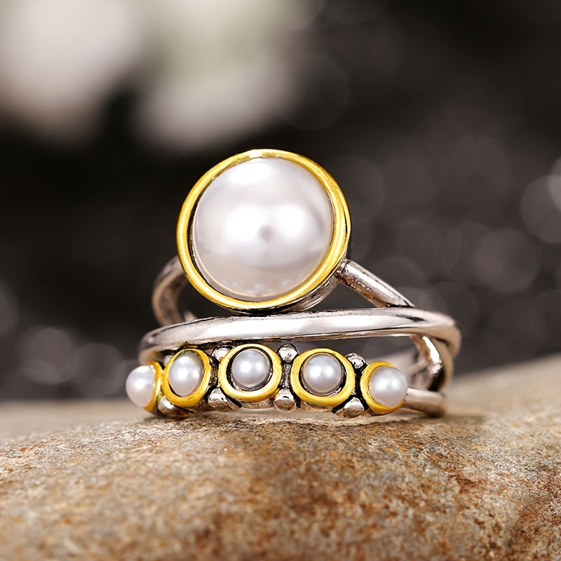 Vintage ring med konstpärla och lagerdesign