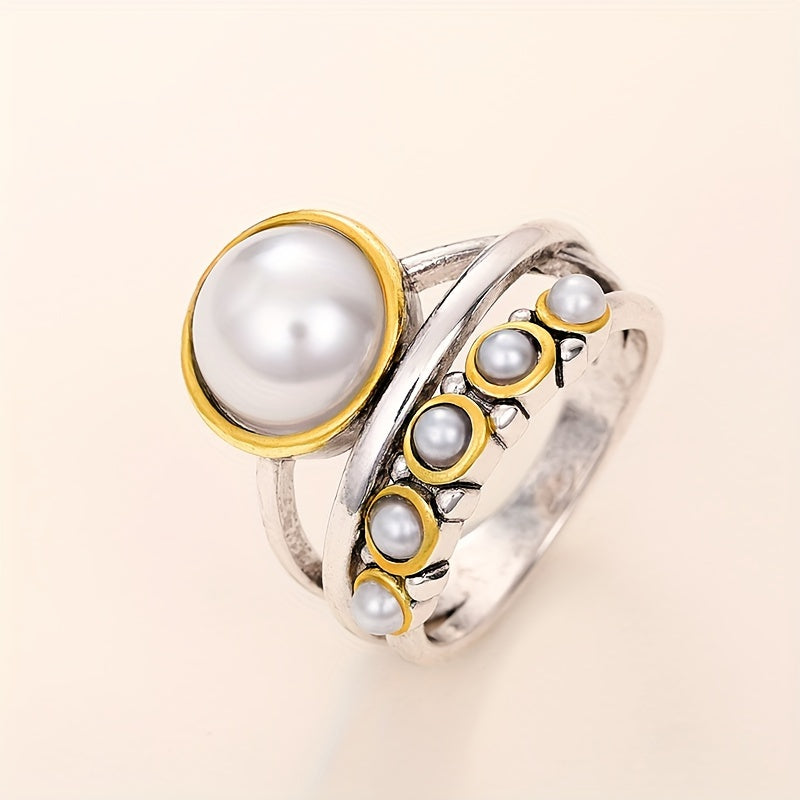 Vintage ring med konstpärla och lagerdesign