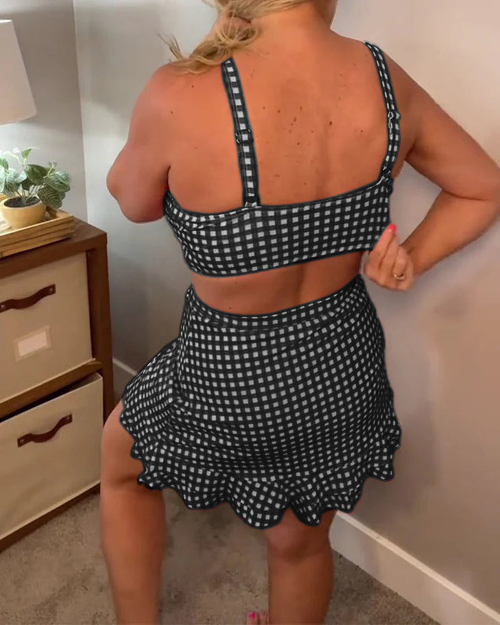 Baddräkt med avslappnat rutigt mönster och tvådelade axelband